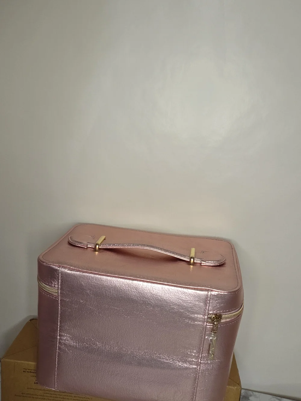 Lancome cute travel case for metallic pink makeup along with a palette of neutra
